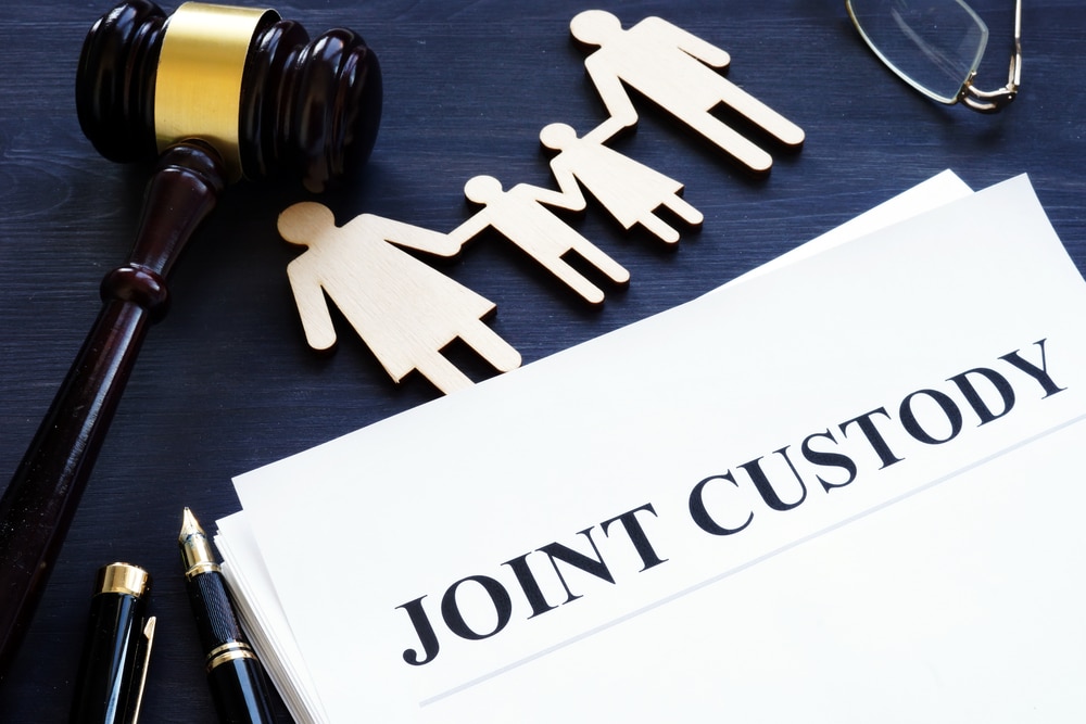 Can a parent be penalized for breaking a parenting time agreement?